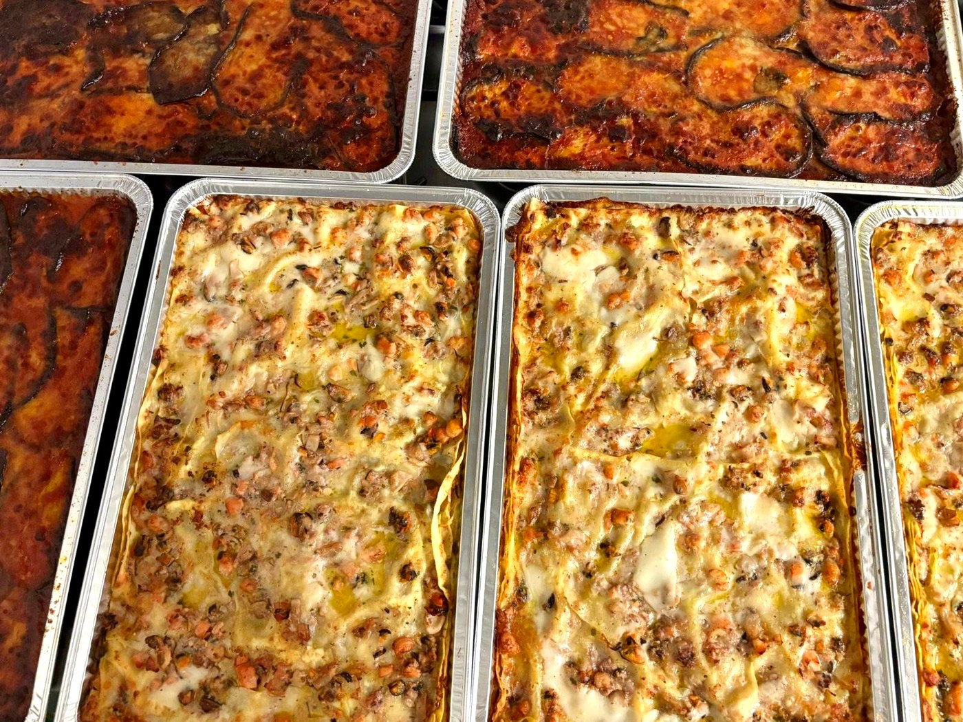 Lasagne di mare e parmigiane di melanzane